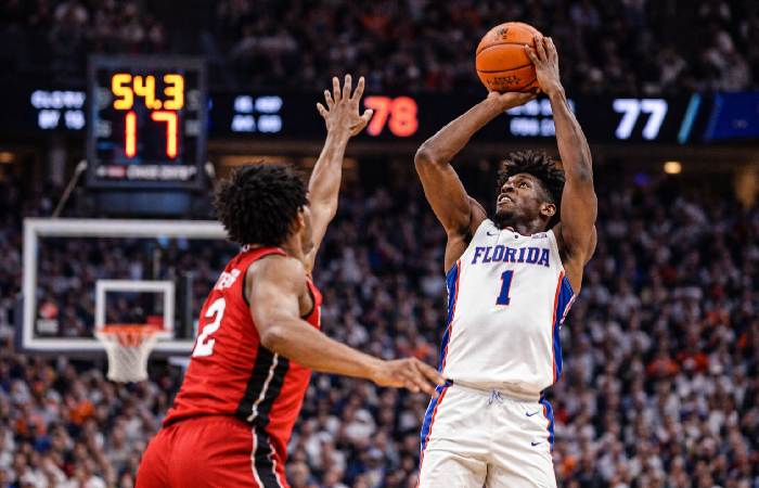 Basketball team celebrating comeback during final minutes