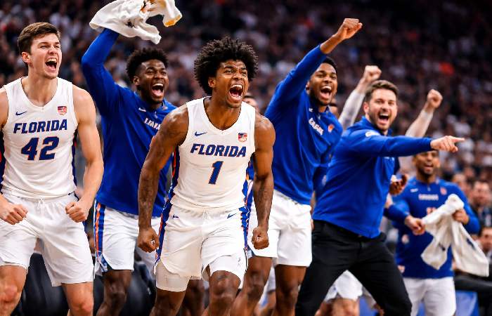 Fadeaway three point shot during clutch basketball moment
